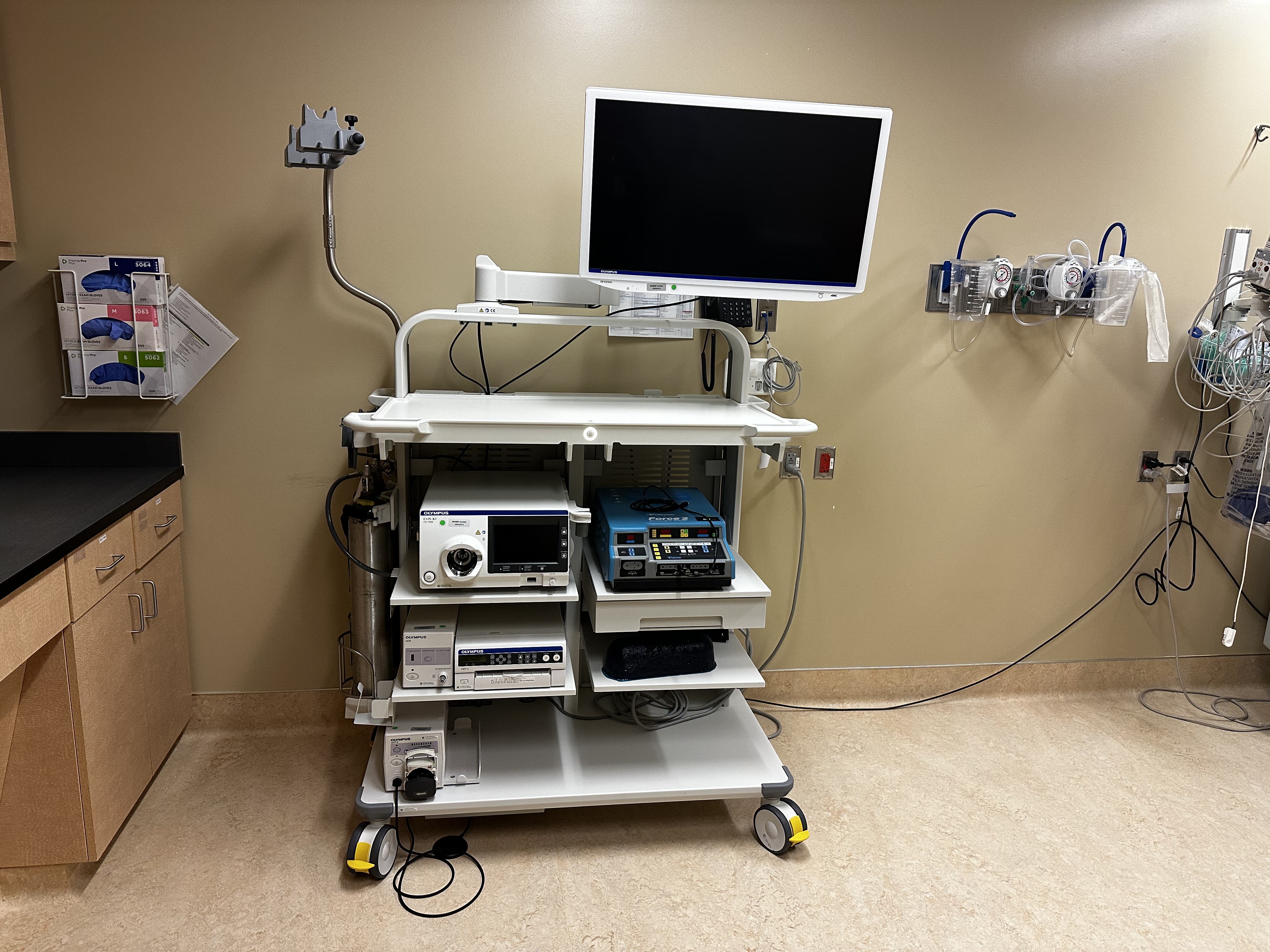 An image of a computer screen and new endoscopy equipment.